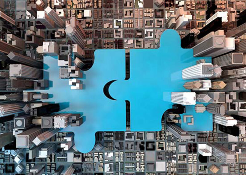 puzzle pieces joining companies and showing merger and acquisition business concept