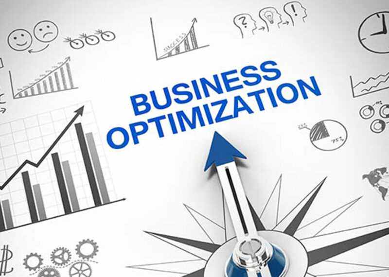 compass needle points towards business optimization