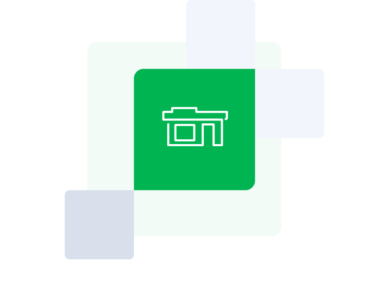 Building icon on green background 