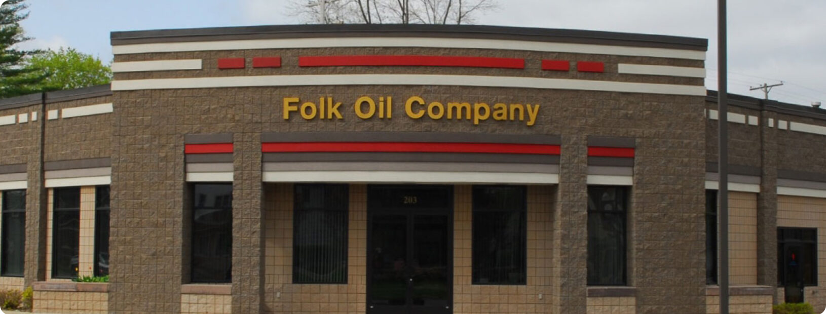 Close-up straight on photograph of Fork Oil Company corporate building.
