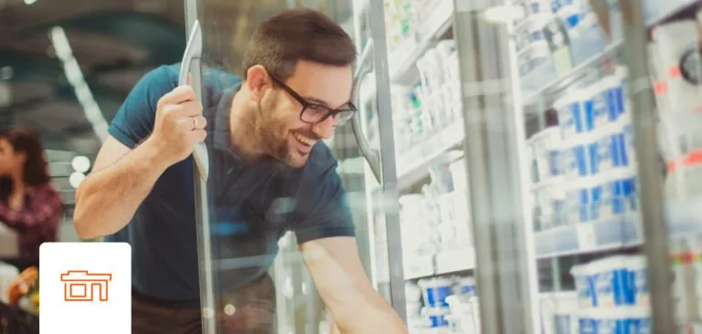 Man shopping for consumer packaged goods at convenience retail location. 