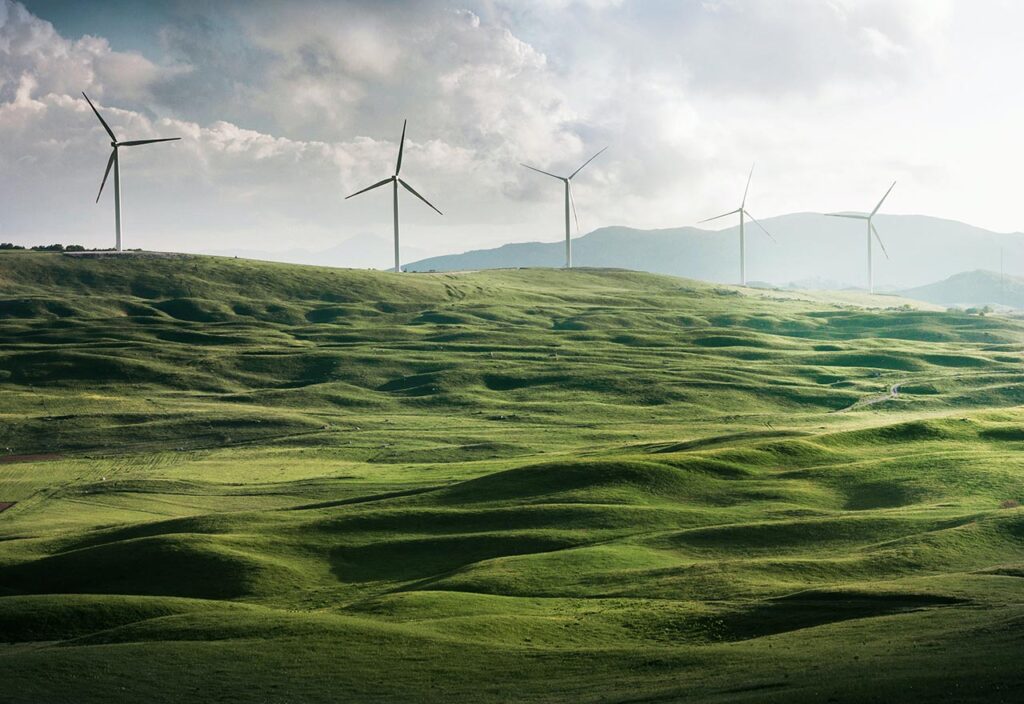 renewable energy windmills in scenic view
