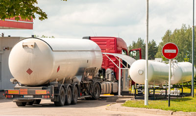 Truck delivery propane to large above ground tanks
