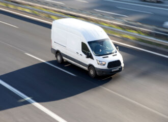 White delivery van, commercial fleet vehicle