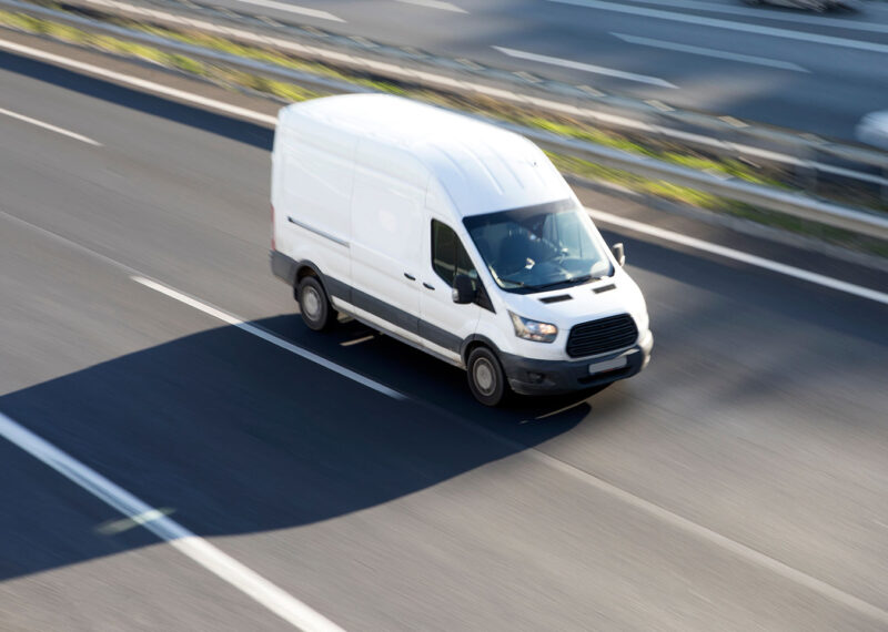 White delivery van, commercial fleet vehicle