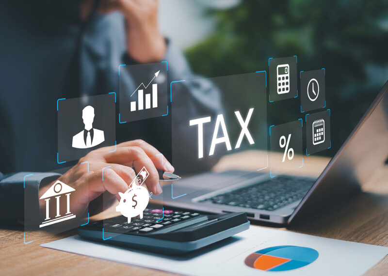 tax return form online for tax payment concept, Businessman calculate annual tax payment, Government, state taxes. Data analysis and tax refund with financial on virtual screen