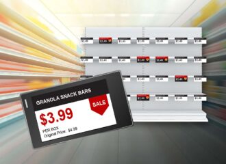 Retail shelves with electronic shelf labels showing prices and a close-up of a sale price for granola snack bars.