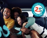 Group of women laughing together in a car, celebrating GasBuddy's 25th anniversary with GasBuddy Rewards and new savings opportunities