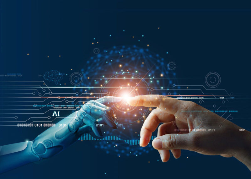 A robotic hand and a human hand reaching toward each other, fingertips almost touching, with glowing digital circuits and AI elements in the background—symbolizing AI-augmented cybersecurity and human-AI collaboration in predictive defense.