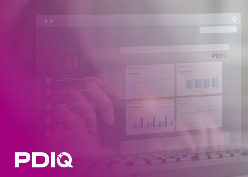 Person typing on a laptop with a translucent PDIQ dashboard overlay showing fuel demand and sales metrics beside an AI processor chip.