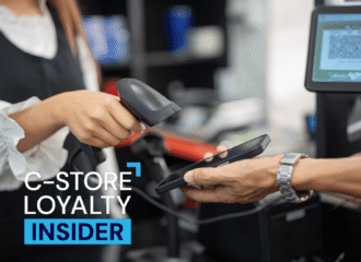 Convenience store customer scanning a loyalty app at checkout