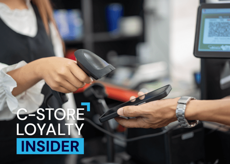 Convenience store customer scanning a loyalty app at checkout