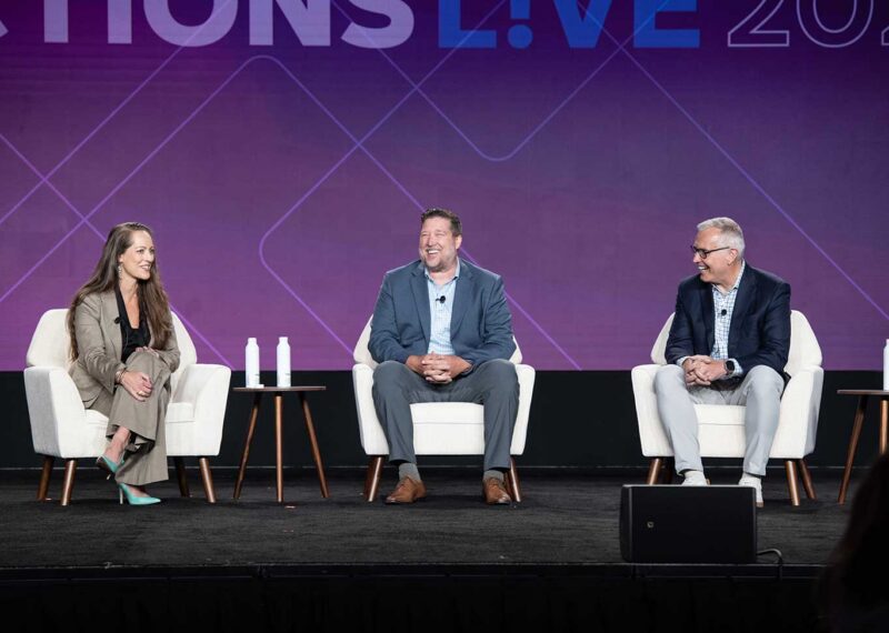 Linnea Geiss, COO of PDI Technologies, Rick Rigby, CTO of Atlantis Management Group, and Jeff Hassman, VP and GM of MyPDI, seated on stage during a panel discussion at Connections Live 2026